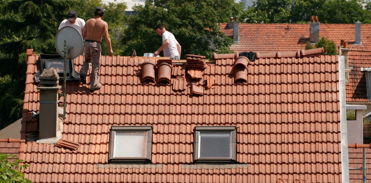 assurer étanchéité cheminée toiture